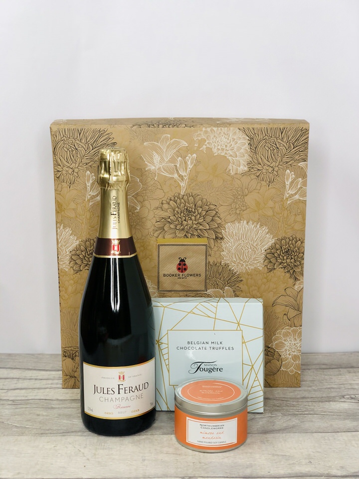 <p>Order this Special Gift Set to celebrate any occasion and you will not be disappointed.  Containing, a bottle of Jules Feraud Champagne, a box of Maison Fougere Belgian Truffles together with an eco-friendly Soy Scented Candle beautifully presented in a stylish Gift Box.</p>
<br>
<h2>Gift Delivery Coverage</h2>
<p>Our shop delivers flowers and gifts to the following Liverpool postcodes L1 L2 L3 L4 L5 L6 L7 L8 L11 L12 L13 L14 L15 L16 L17 L18 L19 L24 L25 L26 L27 L36 L70 ONLY.  If your order is for an area outside unfortunately we cannot process your order because of the difference in stock at other florists.</p>
<br>
<h2>Alcohol Gifts</h2>
<p>As a licensed florist, we are able to supply alcoholic drinks either as a gift on their own or with flowers. We have carefully selected a range that we know you will love either as a gift in itself or to provide that extra bit of celebratory luxury to a floral gift.</p>
<p>This gift set contains a bottle of Jules Feraud Champagne, together with a box of 140g Maison Fougere Milk Chocolate Truffles, together with a locally made eco-friendly Northumbrian Scented Soy Candle in a stylish tin.</p>
<p>Have this giftset delivered to someone special to celebrate as an alternative to having flowers delivered, or have it delivered with your flowers to really celebrate!</p>
<br>
<h2>Online Gift Ordering | Online Gift Delivery</h2>
<p>Through this website you can order 24 hours, Booker Gifts and Gifts Liverpool have put together this carefully selected range of Flowers, Gifts and Finishing Touches to make Gift ordering as easy as possible. This means even if you do not live in Liverpool we make it easy for you to see what you are getting when buying for delivery in Liverpool.</p>
<br>
<h2>Liverpool Flower and Gift Delivery</h2>
<p>We are open 7 days a week and offer advanced booking flower delivery, same-day flower delivery, Guaranteed AM Flower Delivery and also offer Sunday Flower Delivery.</p>
<p>Our florists Deliver in Liverpool and can provide flowers for you in Liverpool, Merseyside. And through our network of florists can organise flower deliveries for you nationwide.</p>
<br>
<h2>Beautiful Gifts Delivered | Best Florist in Liverpool</h2>
<p>Having been nominated the Best Florist in Liverpool by the independent Three Best Rated for the 5th year running you can feel secure with us</p>
<p>You can trust Booker Gifts and Gifts to deliver the very best for you.</p>
<br>
<h2>5 Star Google Review</h2>
<p><em>So Pleased with the product and service received. I am working away currently, so ordered online, and after my own misunderstanding with online payment, I contacted the florist directly to query. Gemma was very prompt and helpful, and my flowers were arranged easily. They arrived this morning and were as impactful as the pictures on the website, and the quality of the flowers and the arrangement were excellent. Great Work! David Welsh</em></p>
<br>
